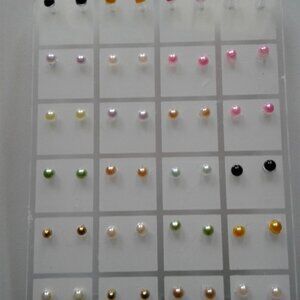 plastic earrings Colors may vary 12 pairs
